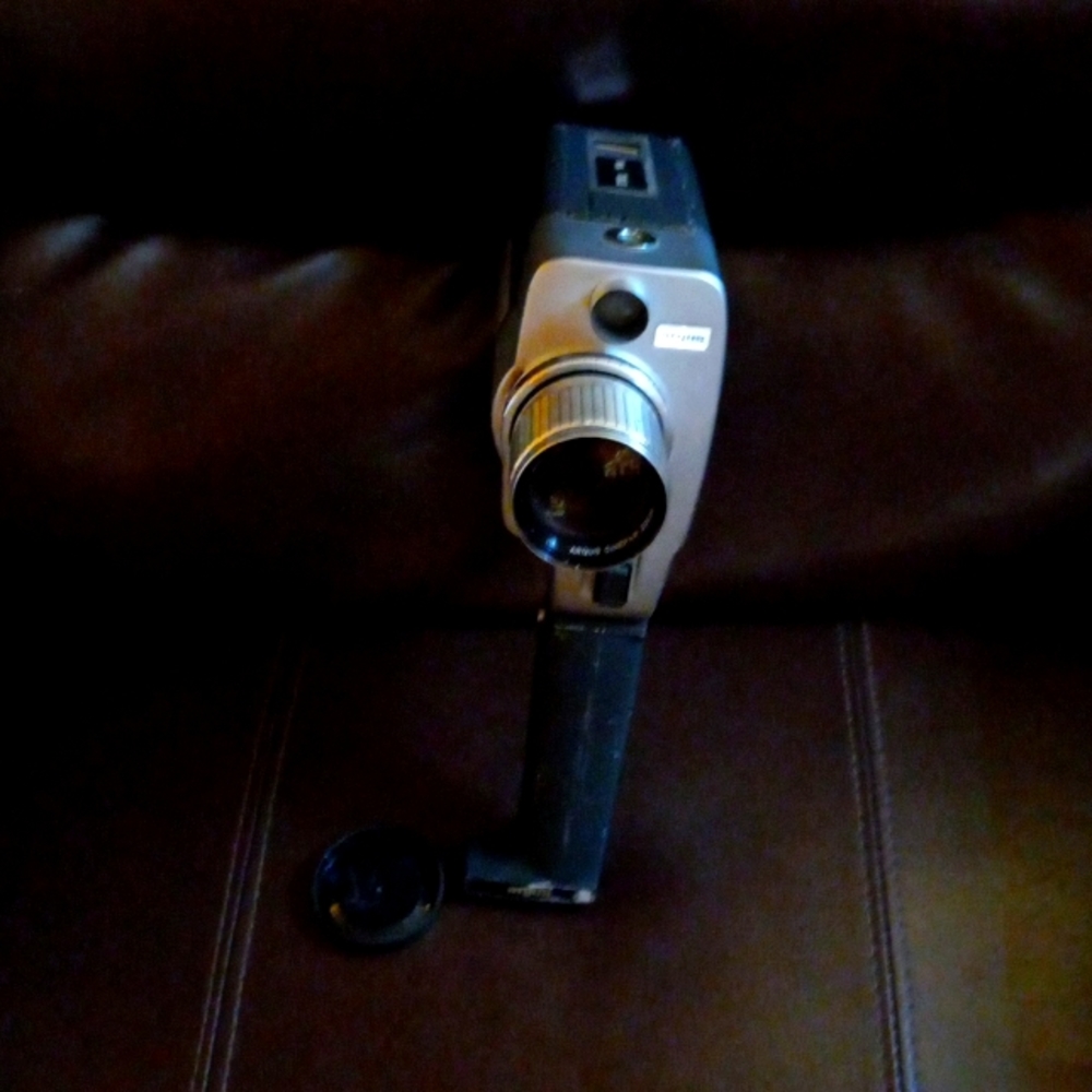 A black and silver Argus 6 inches height.